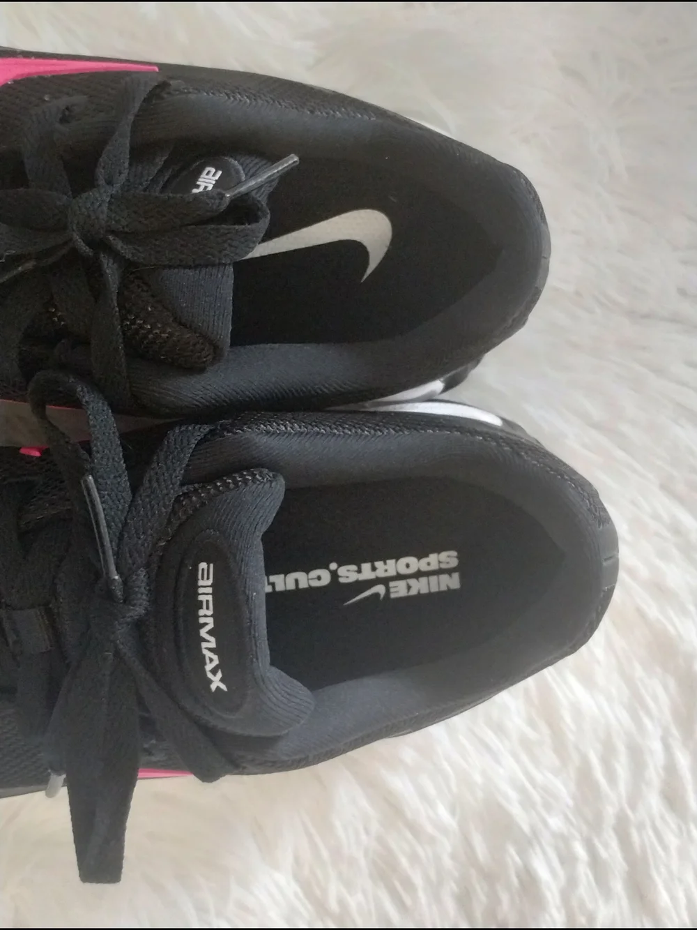 Nike Women's Black Athletic Sneakers with Pink Swoosh